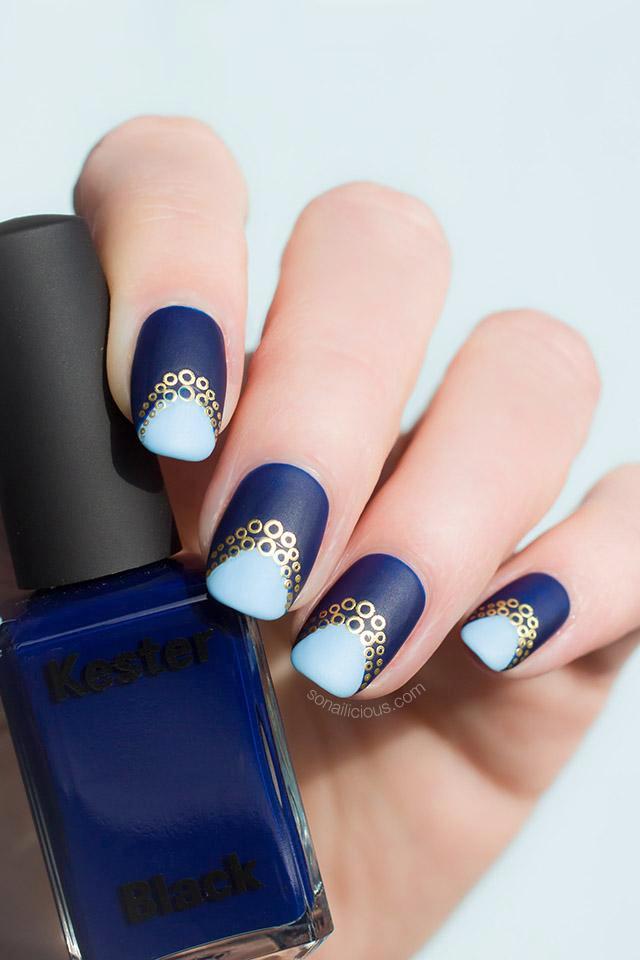 dark blue and gold nails with kester black bleu