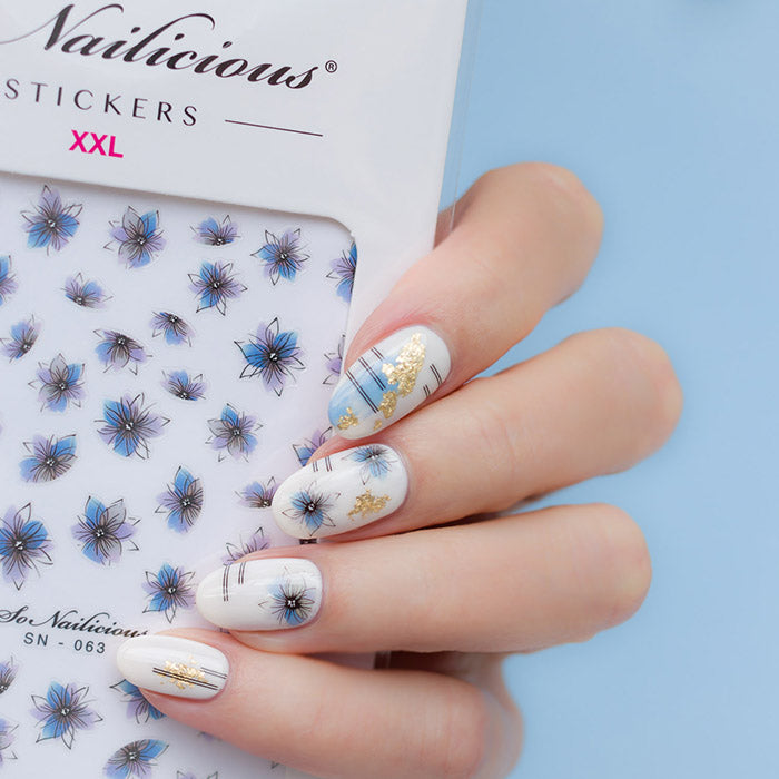 blue and white nails with sonailicious stickers
