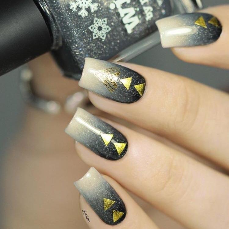 Festival nail art with gold stickers