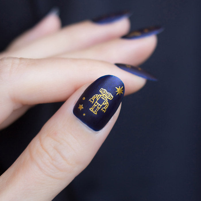 Cosmic robot nails with Interstellar stickers