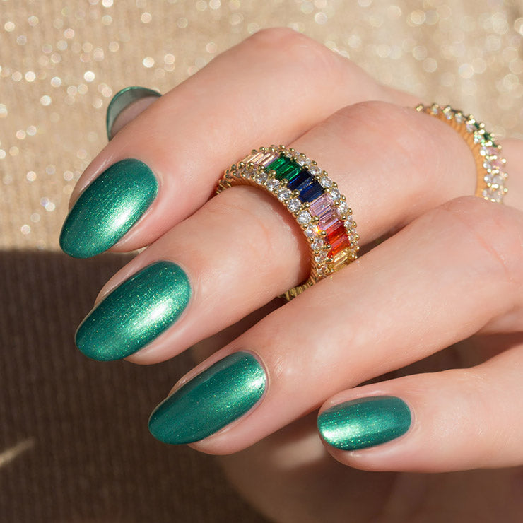 Opulent rainbow ring with emerald nails