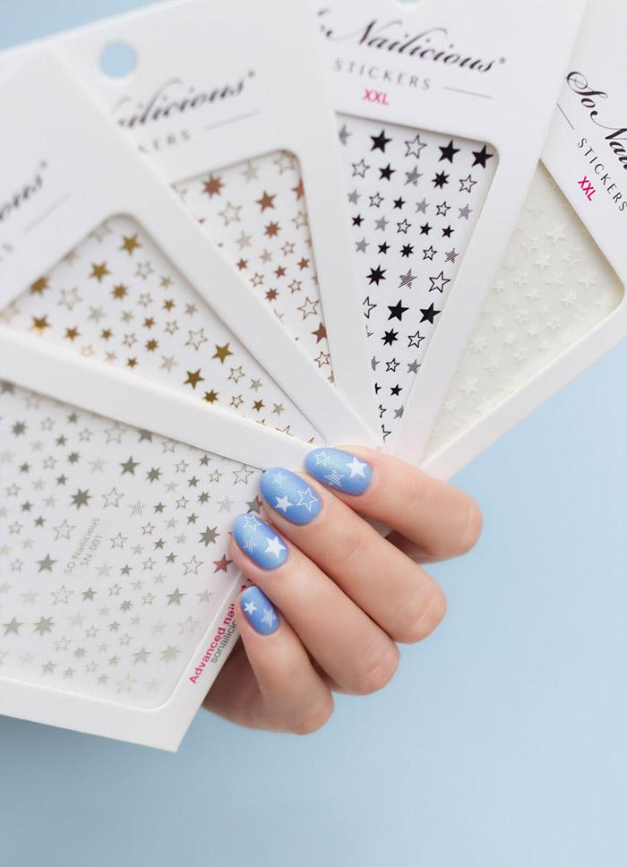 white and blue star nails