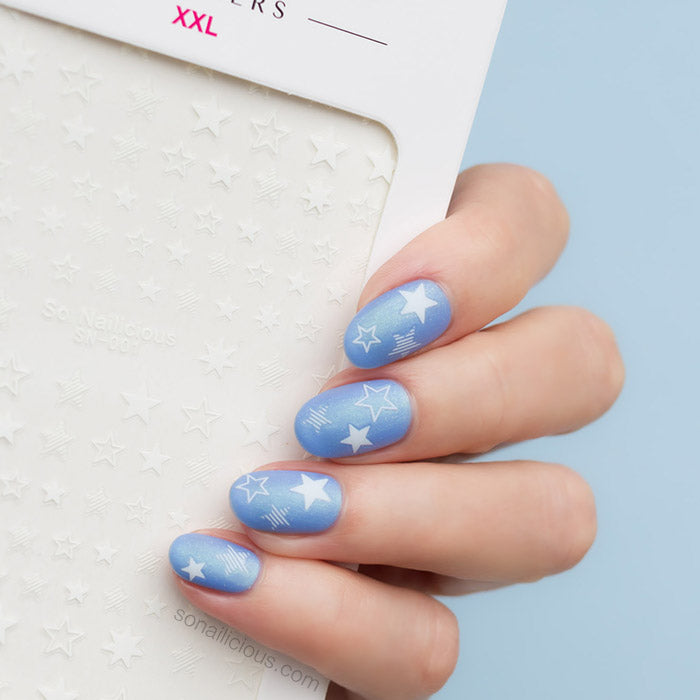 blue and white star nails with star stickers