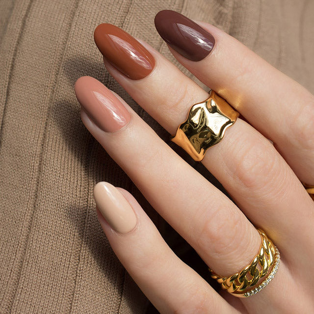Gold chain link ring with Brown nails