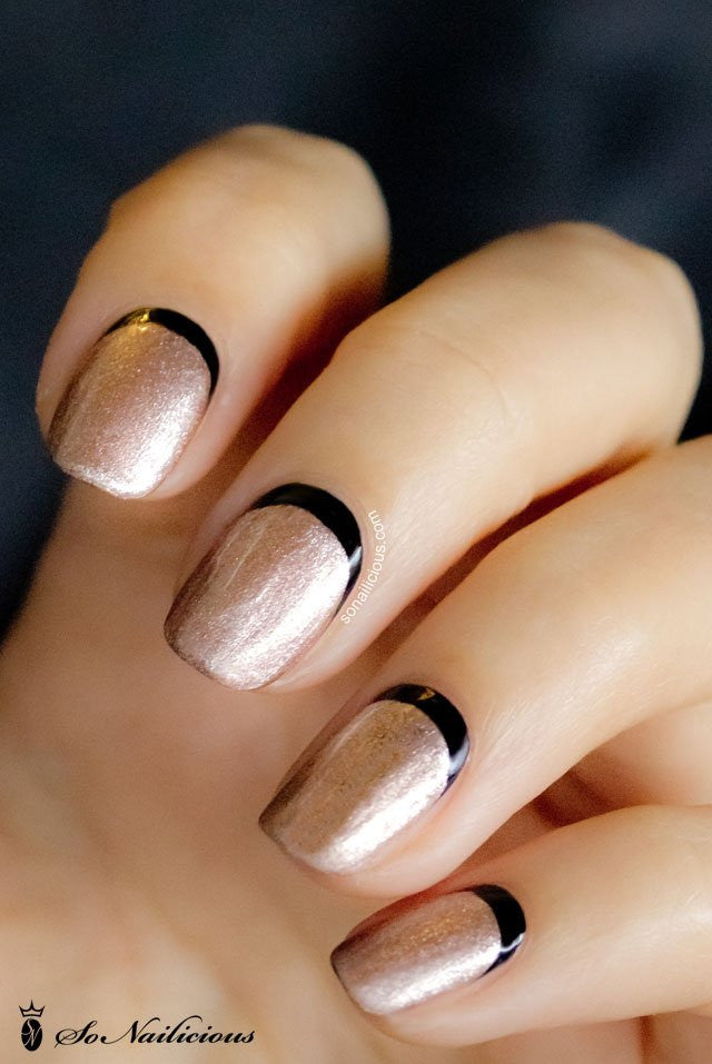 Gold and black Ruffian nails