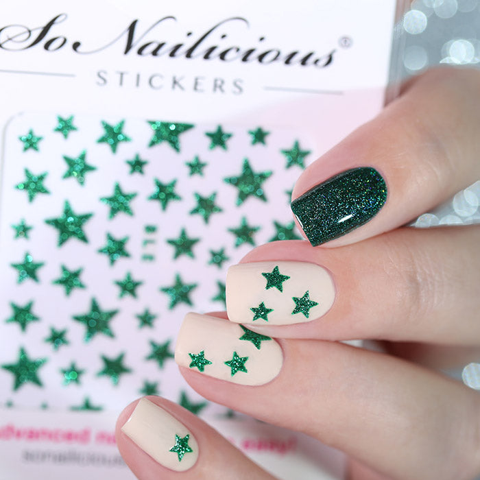 Green nails with green glitter star stickers
