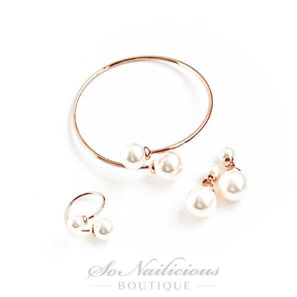 Pearl earrings, pearl bracelet and pearl rings