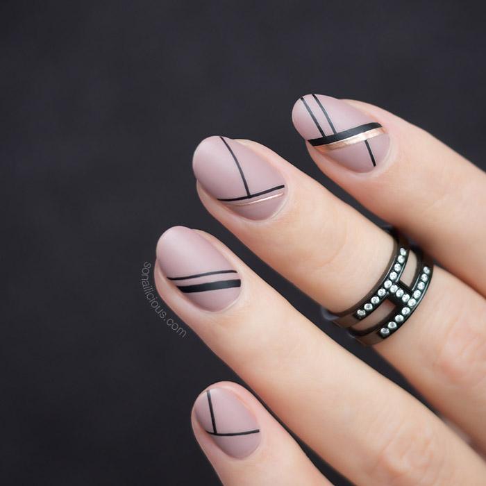 nude and black nails with Stripe stickers