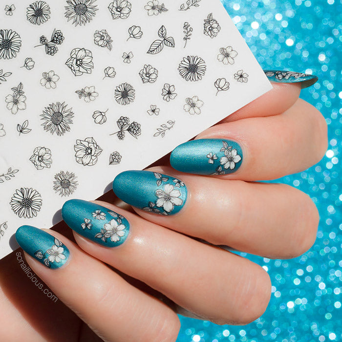 white and blue nails with sonailicious floral nail stickers